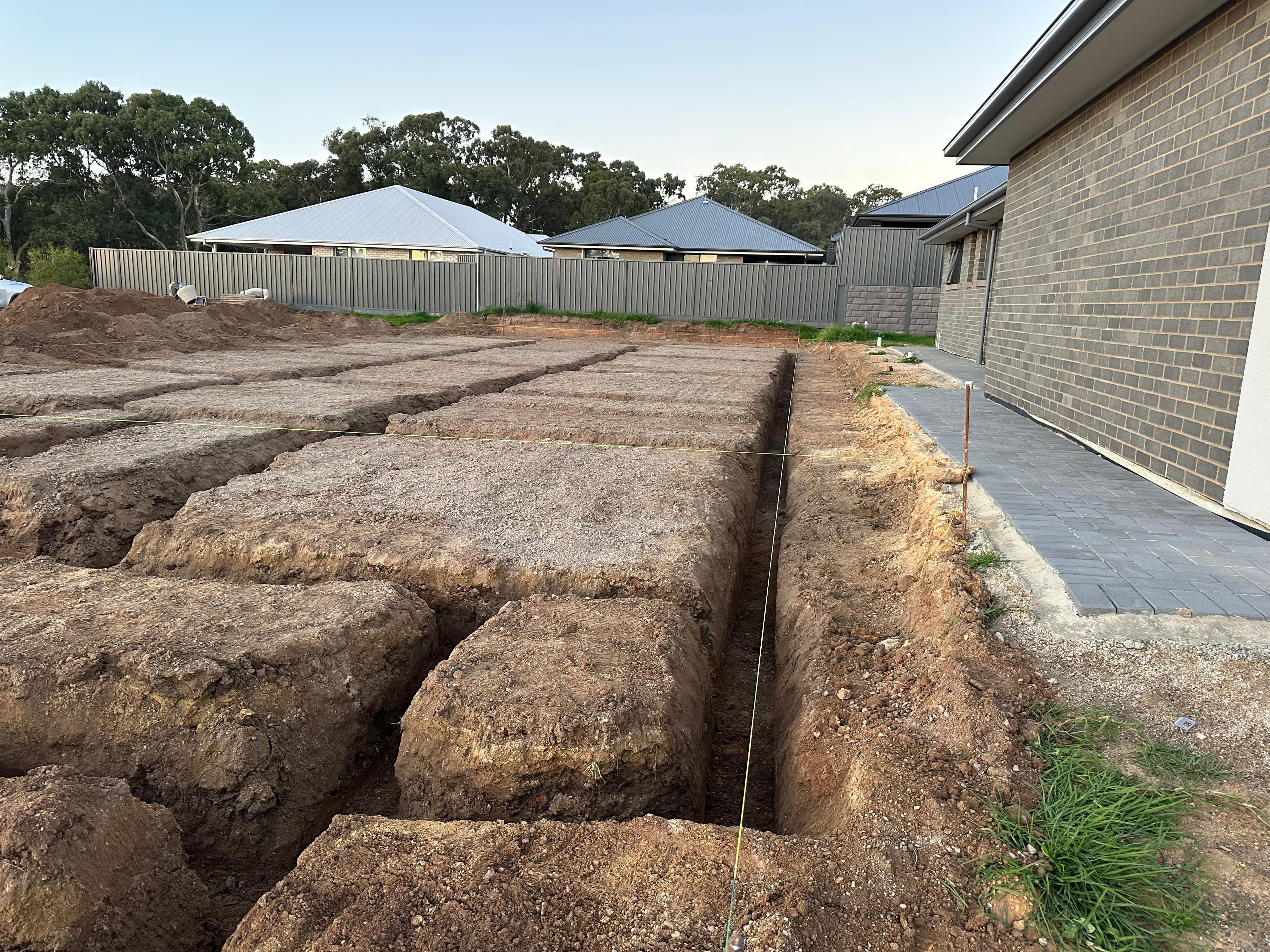 Mount Barker footing project - close-up of reinforcement mesh and service penetrations across the footing area